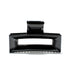 Frame 9 claw clip in Piano Black — architectural jet-black cellulose acetate hair clip, made in France