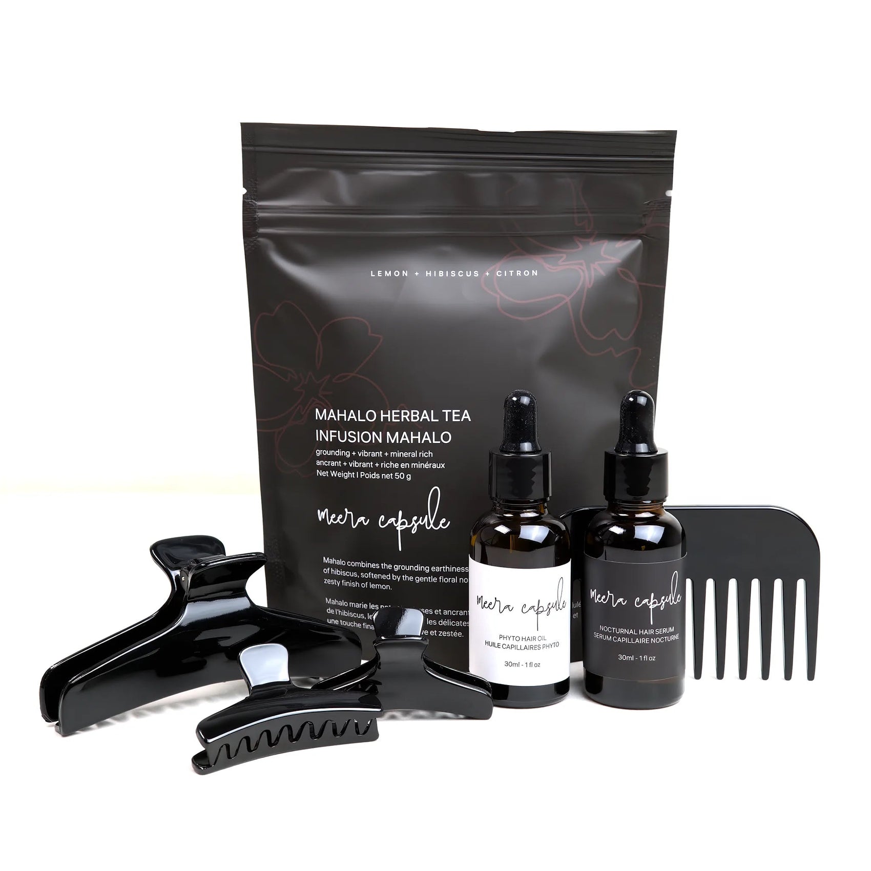 Bambi Nourish Capsule in Piano Black — Meera evening ritual bundle with Bambi jet-black clip, Phyto Oil, Nocturnal Serum, and Mahalo Tea