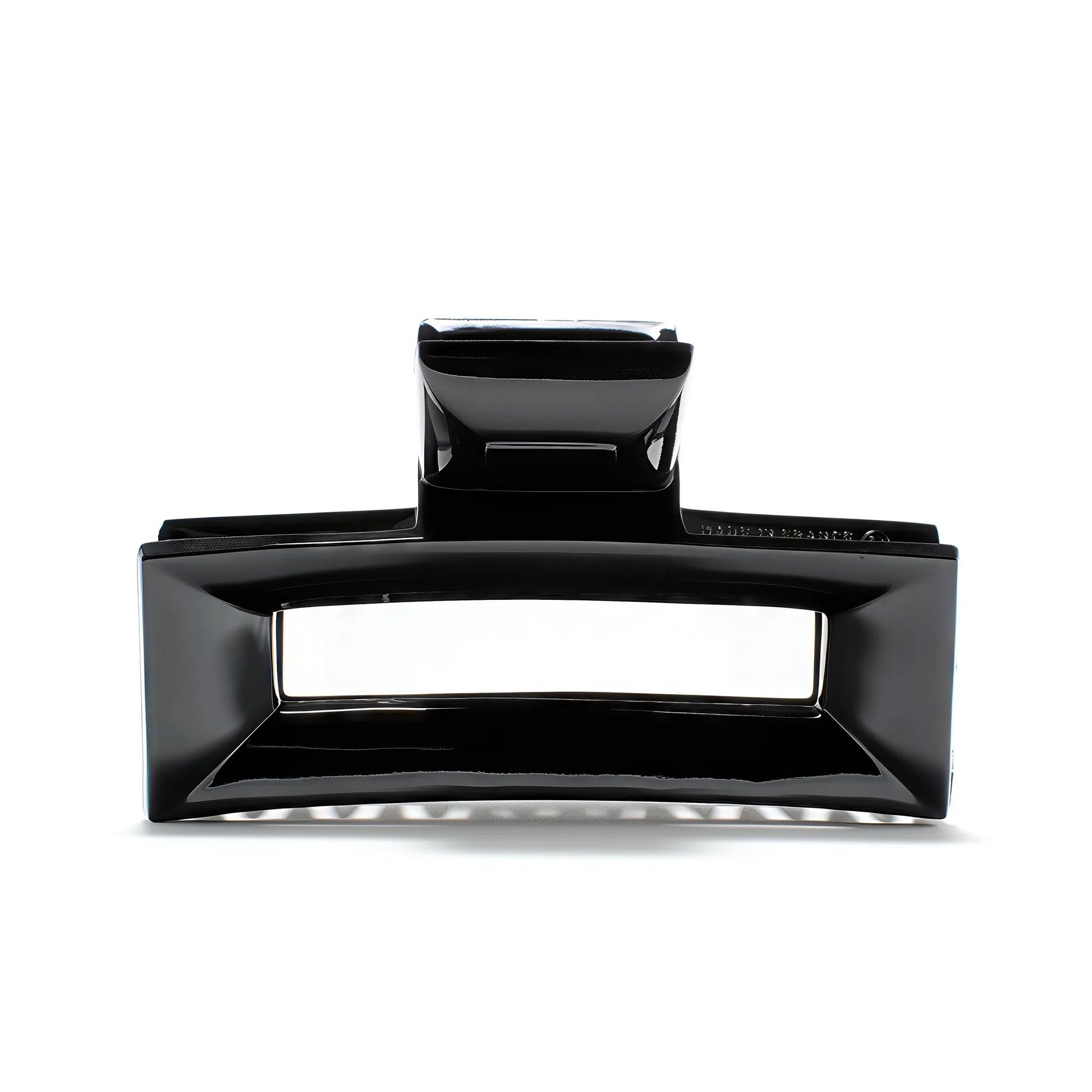 Frame 9 claw clip in Piano Black — architectural jet-black cellulose acetate hair clip, made in France