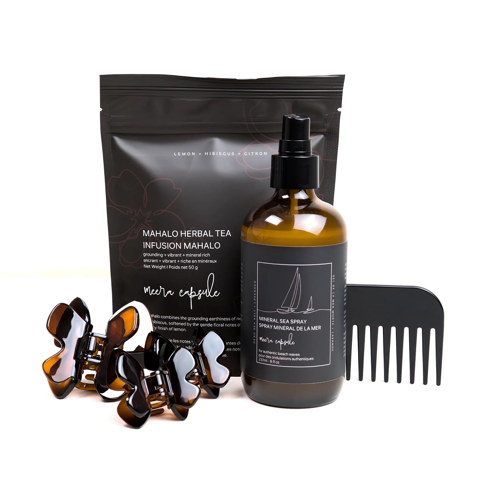 Phoebe Beach Capsule in Deep Amber — Meera summer bundle with Phoebe tortoise clips, Mineral Sea Spray, and Mahalo Herbal Tea