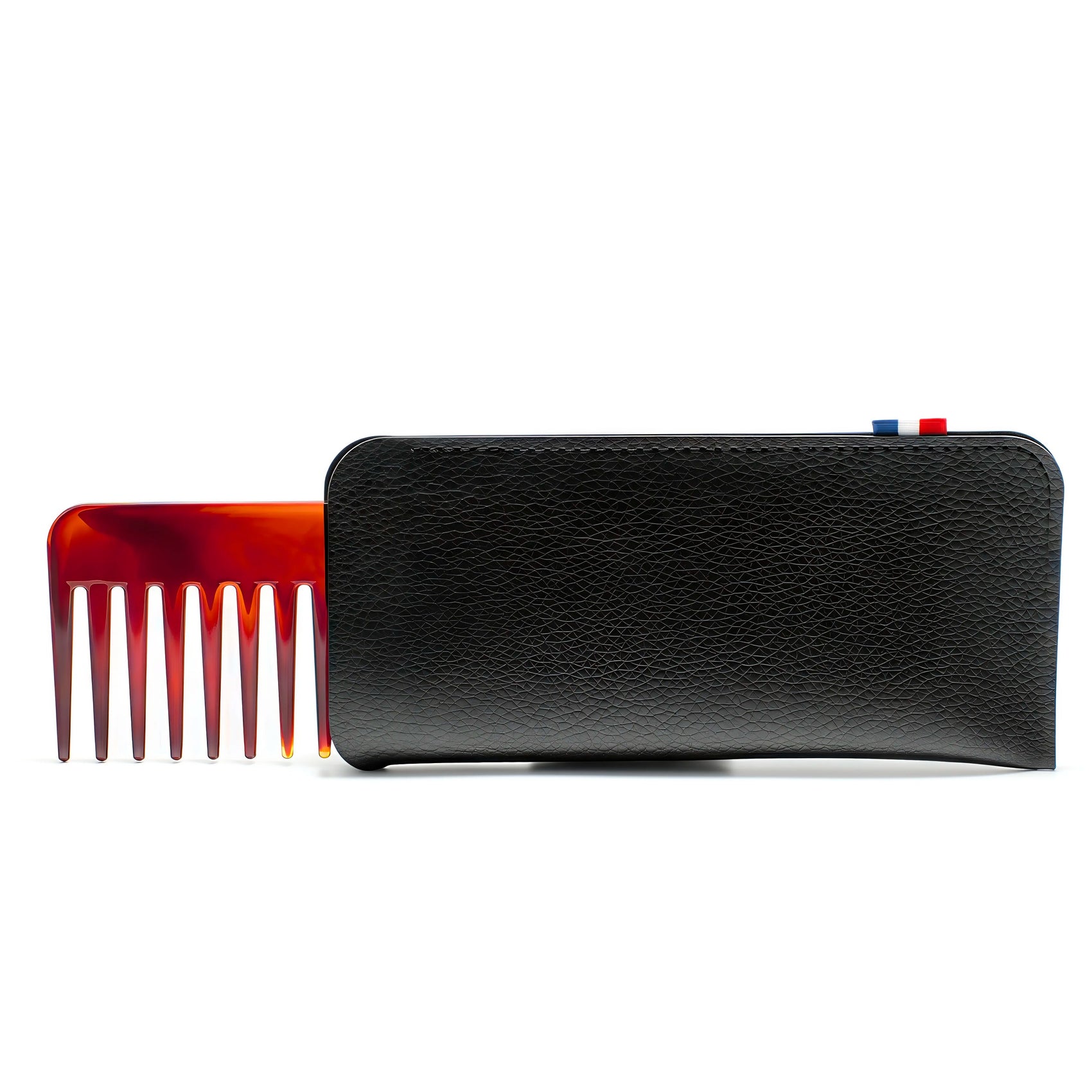 Studio 16 styling comb with Sequoia leather case — full-size French acetate comb in tan leather sleeve